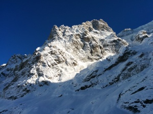 Le Grave has awesome scenery. If you squint you can see a big cloud of snow thrown up by an avalanche off the rock band.
